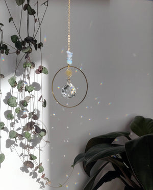 Open image in slideshow, DOLCE suncatcher in brass, glass crystal, and gems
