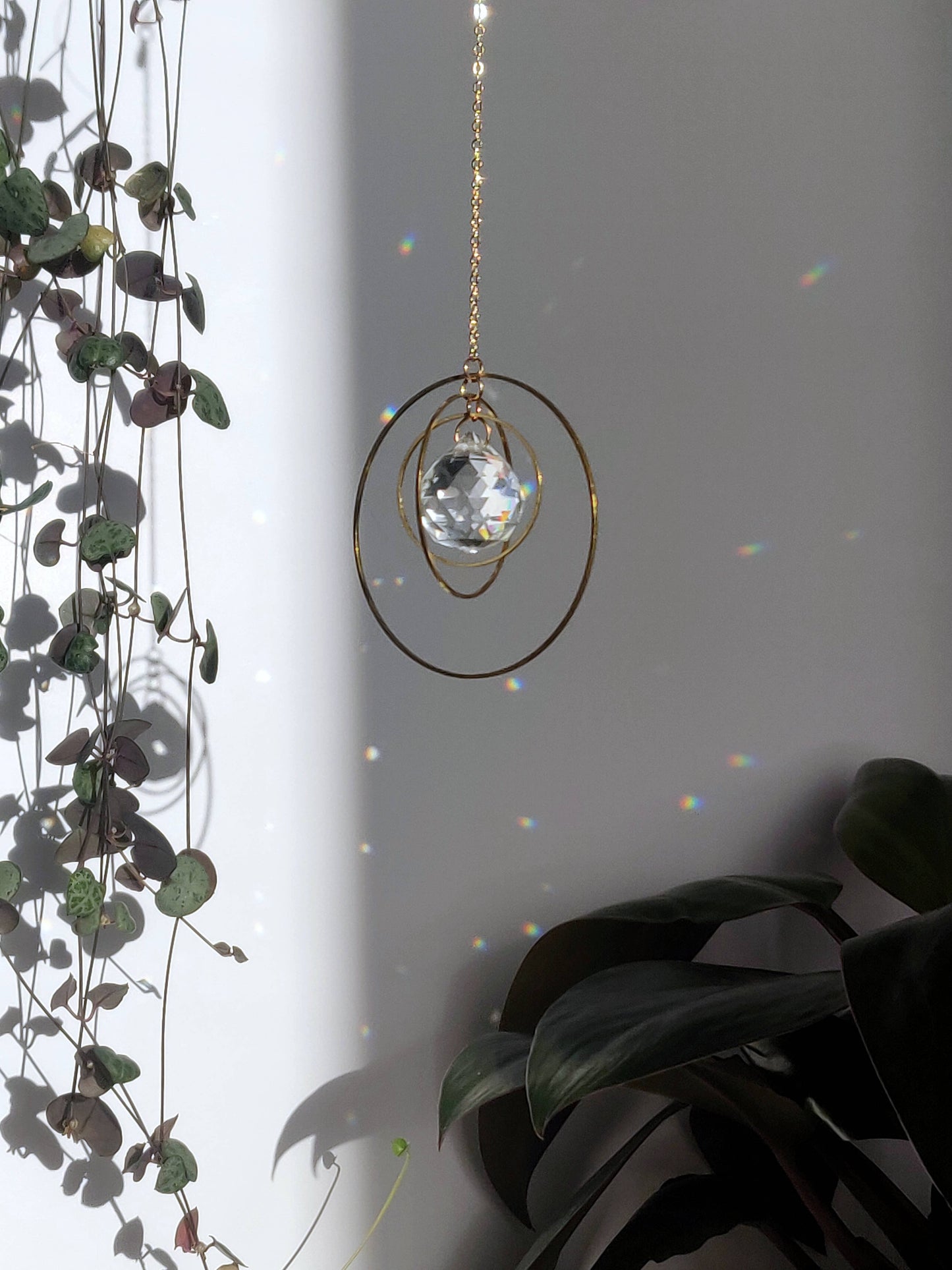GALAXY suncatcher in brass and glass crystal